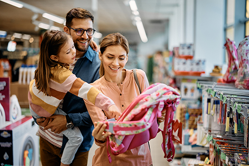 Mom, dad and daughter out shopping